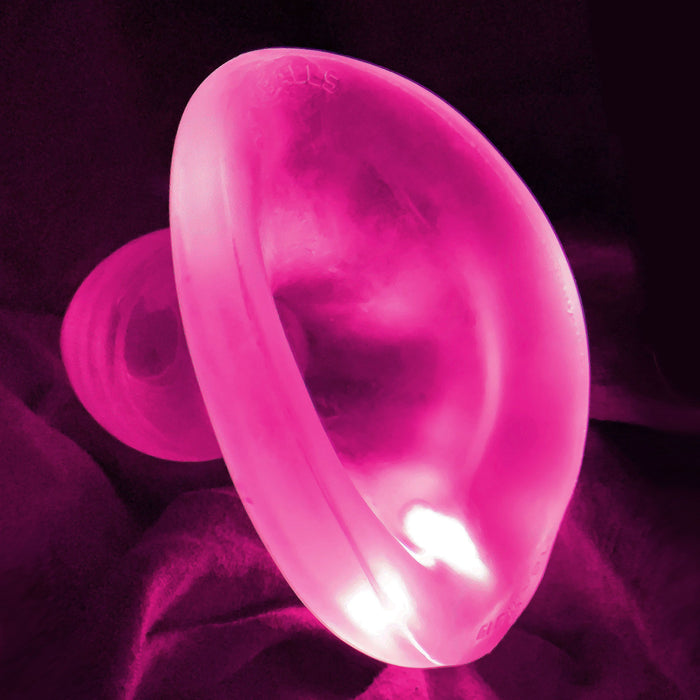 plug anal con hueco para abrir el ano de color transparente alumbrado por la led de color rosado