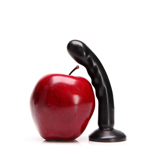 dildo anal prostata p spot negro compact tantus con una manzana roja al lado